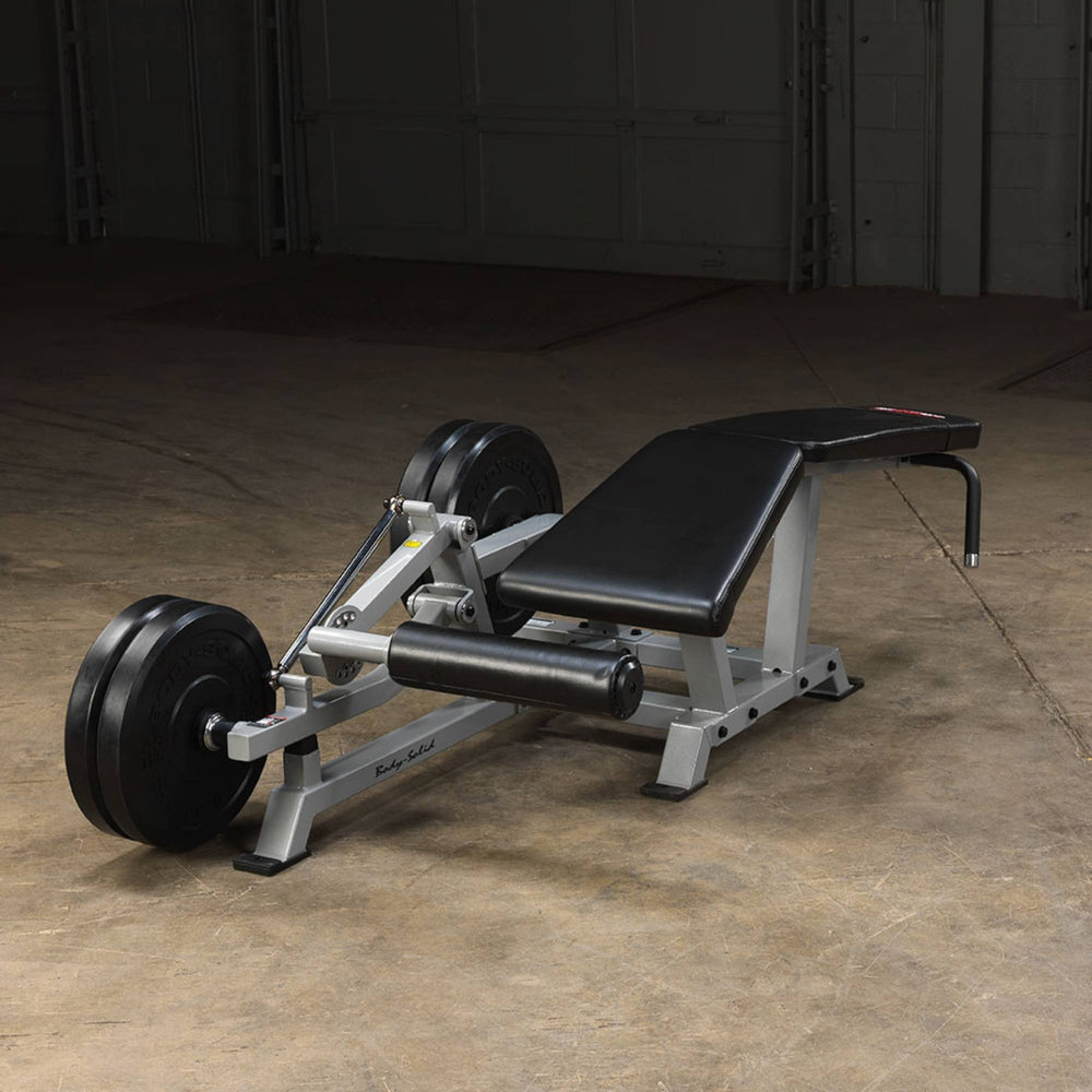 Body-Solid Pro ClubLine Leverage Leg Curl LVLC Machine Backview with weight plates added