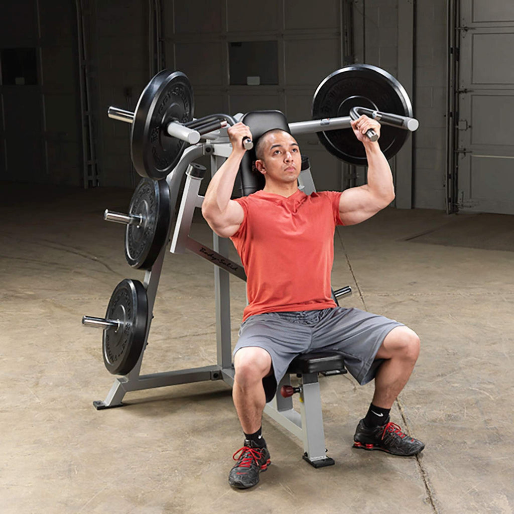 Body-Solid Pro ClubLine Leverage Shoulder Press LVSP a person using a shoulder press machine