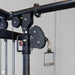 Body-Solid Pro ClubLine SJG Jungle Gym SJG800 Close-up of adjustable pulley mechanism and cable handle attachment on Body-Solid Pro Club Line gym machine.

