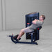 Body-Solid Pro ClubLine Series 2 Ab and Back S2ABBX Man reclining to perform back extension exercise using Body-Solid ProClubLine ab and back machine, hands crossed over chest.

