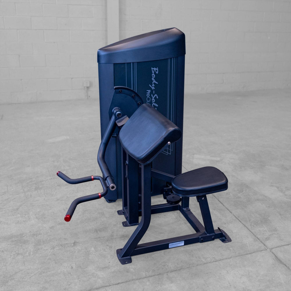 Body-Solid Pro ClubLine Series 2 Arm Curl S2ACX Body-Solid ProClubLine arm curl machine with padded preacher curl support and adjustable seat in a gym.
