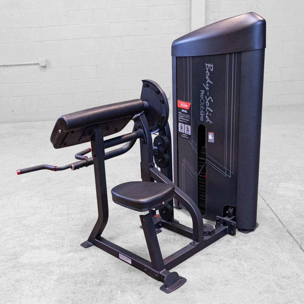 Body-Solid Pro ClubLine Series 2 Arm Curl S2ACX Front-angle view of Body-Solid ProClubLine arm curl machine with black frame and cushioned seat.