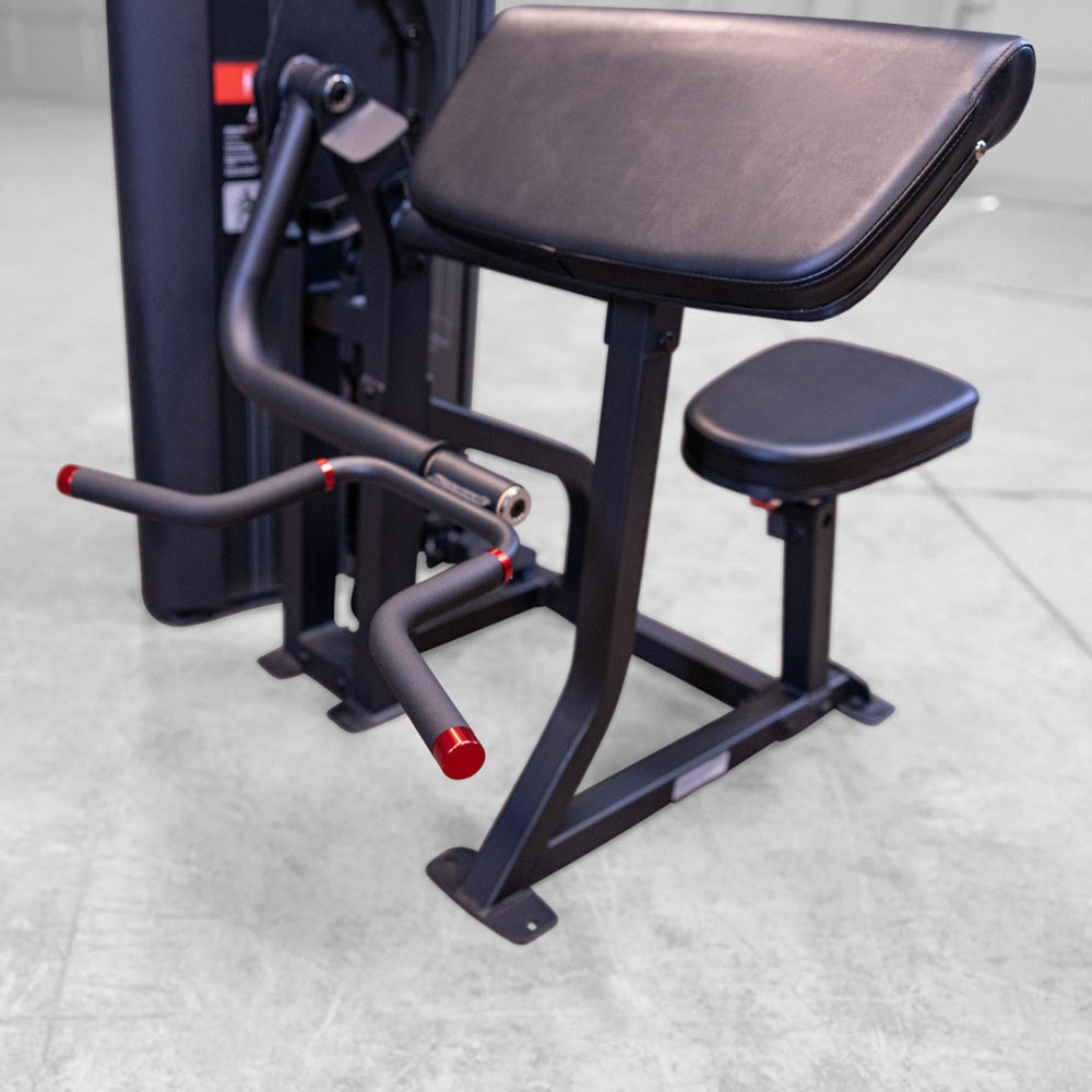 Body-Solid Pro ClubLine Series 2 Arm Curl S2ACX Preacher curl arm pad and dual angled curl handles on the Body-Solid ProClubLine arm curl machine
