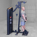 Body-Solid Pro ClubLine Series 2 Biceps Triceps S2BTPX Man performing a rope tricep pushdown on a tall Body-Solid cable machine while standing upright in a gray industrial gym.