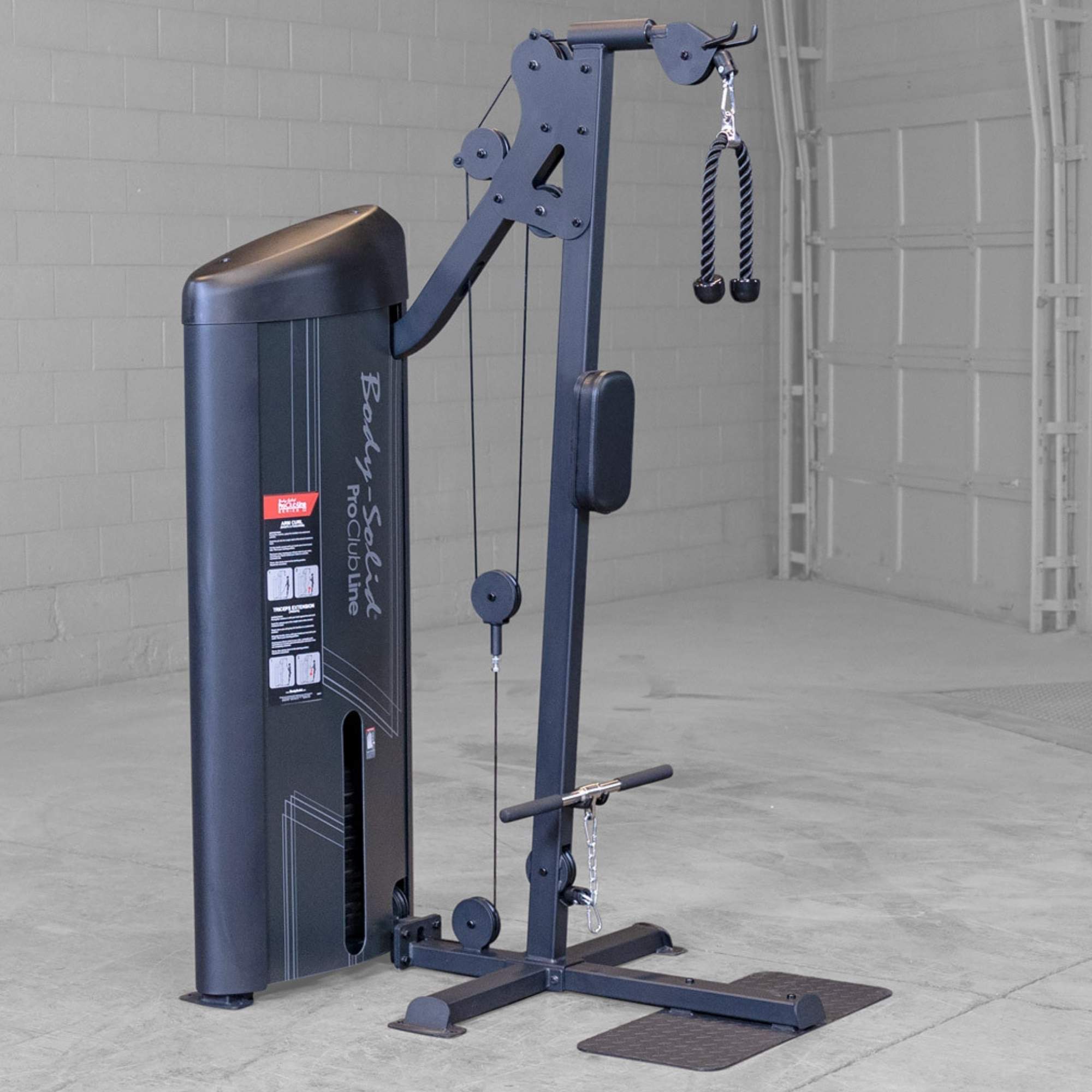 Body-Solid Pro ClubLine Series 2 Biceps Triceps S2BTPX Tall Body-Solid Pro Club Line cable machine with rope attachment hanging from the upper pulley in an empty gym.