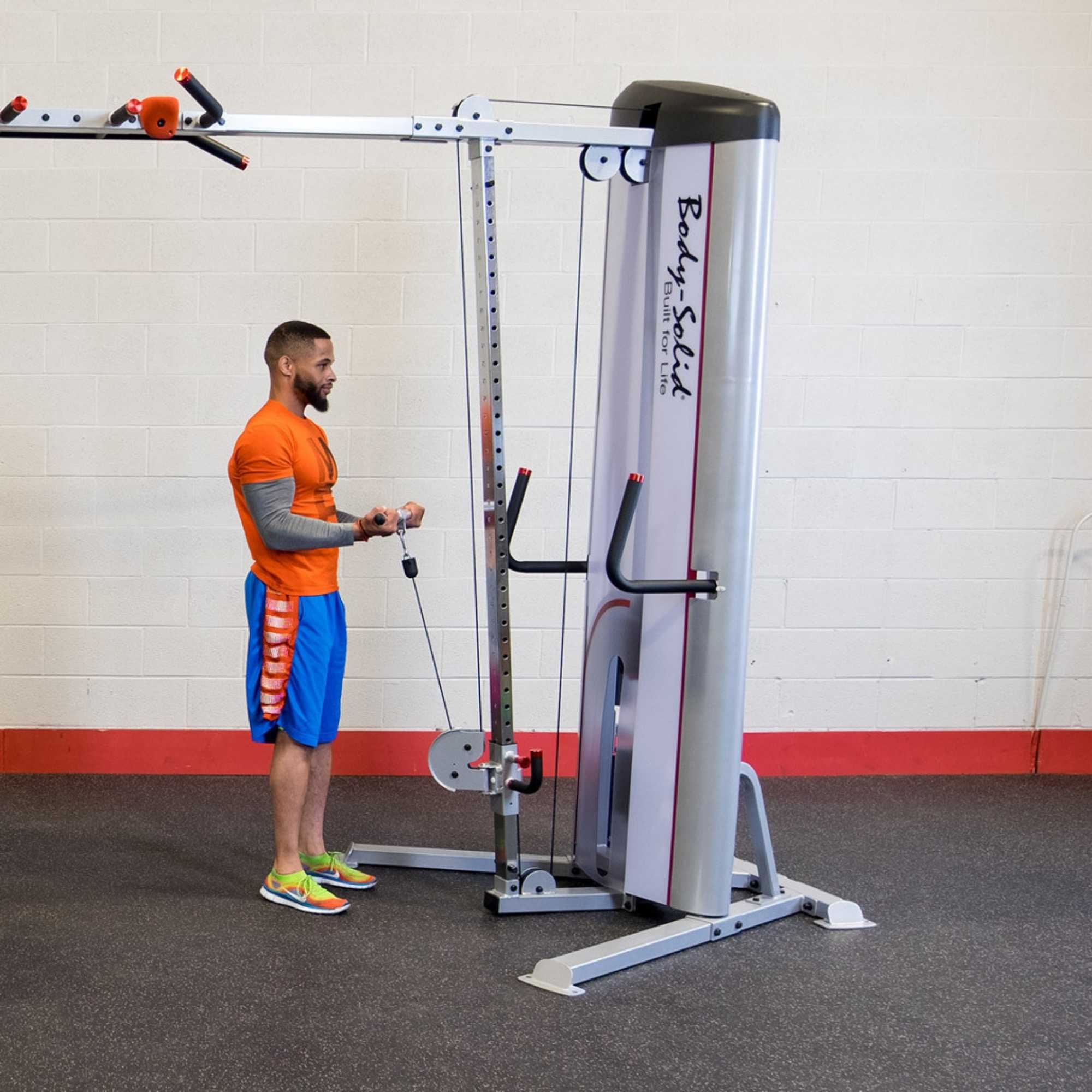 Body-Solid Pro ClubLine Series 2 Cable Crossover S2CCO  Man doing cable bicep curls on  single column pulley machine