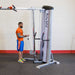 Body-Solid Pro ClubLine Series 2 Cable Crossover S2CCO  Man doing cable bicep curls on  single column pulley machine