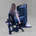 Body-Solid Pro ClubLine Series 2 Inner Outer Thigh S2IOTX Back view of woman seated on a hip abductor machine with legs spread apart during the exercise motion