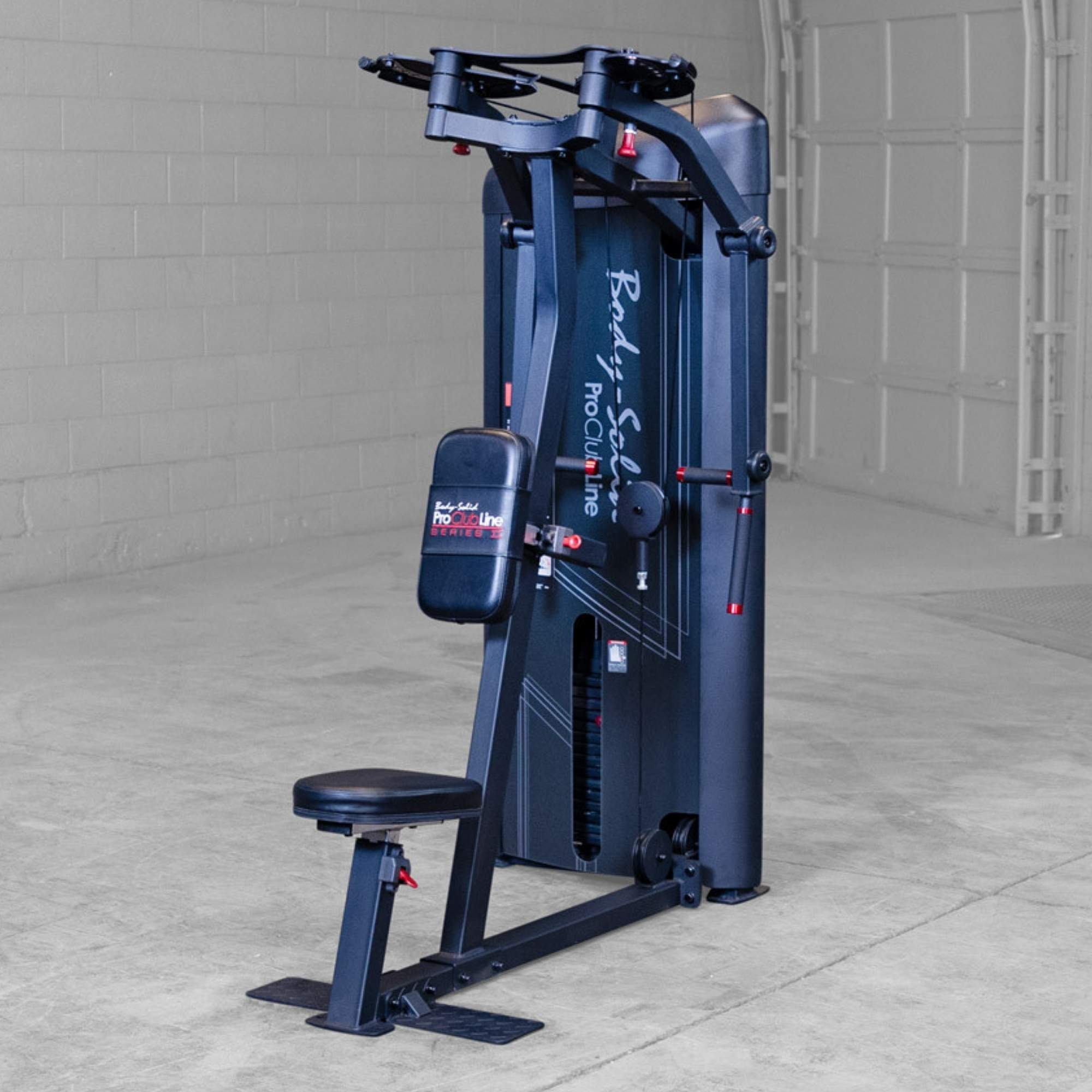 Body-Solid Pro ClubLine Series 2 Pec Delt S2PECX Angled view of Body-Solid ProClub Line pec deck and rear delt combo machine showing padded seat, weight enclosure, and adjustable arms