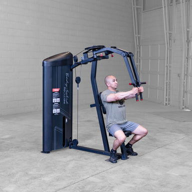 Body-Solid Pro ClubLine Series 2 Pec Delt S2PECX Man seated on Body-Solid ProClub Line machine performing a chest fly exercise with arms extended forward