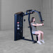 Body-Solid Pro ClubLine Series 2 Pec Delt S2PECX Woman using Body-Solid ProClub Line pec deck machine performing chest fly with arms together in front
