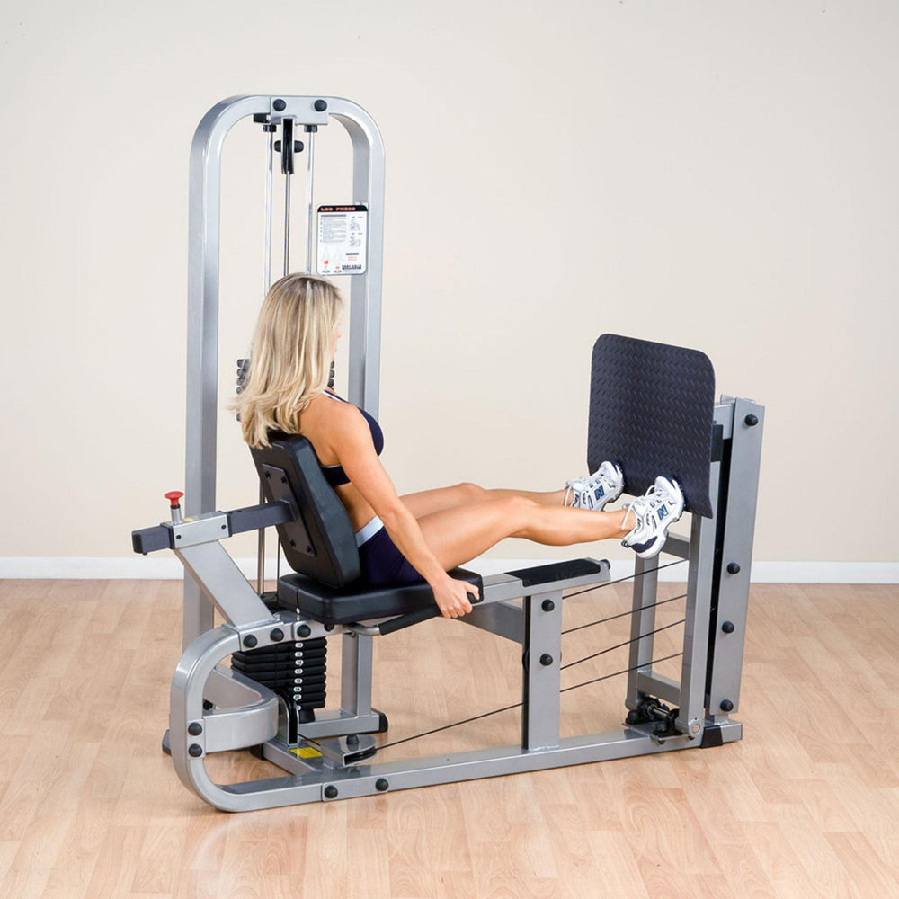 Body-Solid Pro Club Line Leg Press SLP500G Women Leg press exercise using 