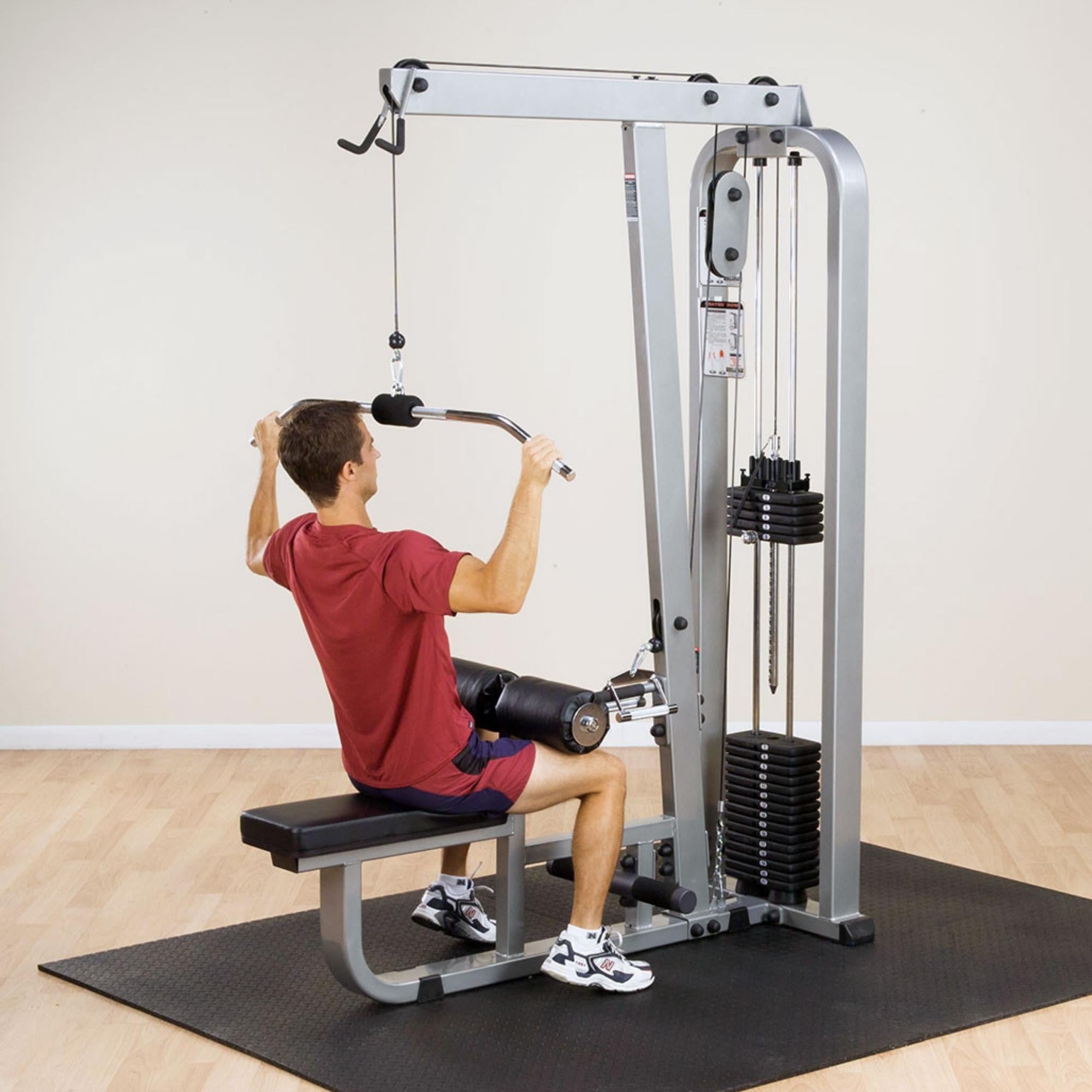 Body-Solid Pro Clubline Lat Mid Row SLM300G Man performing wide-grip lat pulldown 