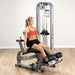 Body-Solid Pro Clubline Leg Extension SLE200G Woman performing