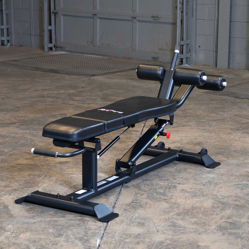 Body-Solid Proclub Commercial Ab Bench SAB500B Adjustable decline bench with leg rollers in an upright position
