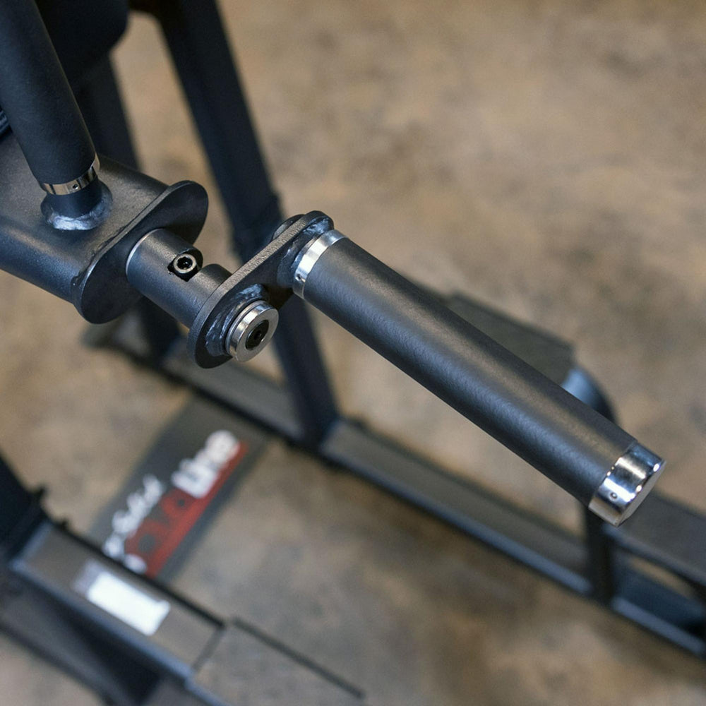 Body-Solid Proclub Vertical Knee Raise SVKR1000BX Detailed view of a padded dip station handle with chrome-capped ends on a power tower frame.