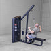 Body-Solid Series 2 Lat Mid Row S2LATX  Man seated on Body-Solid ProClub Line lat pulldown machine performing a wide-grip pulldown exercise with back muscles engaged
