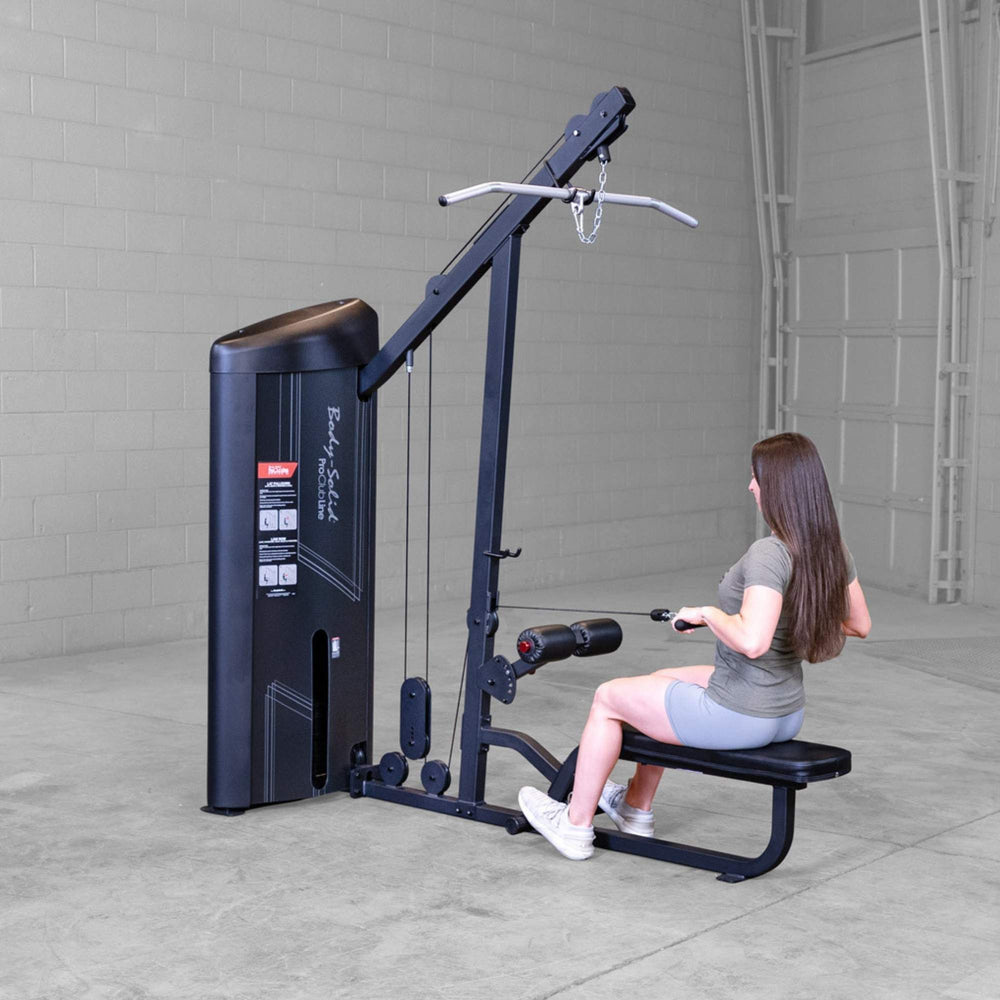 Body-Solid Series 2 Lat Mid Row S2LATX  Rear view of woman performing a seated low row exercise on the Body-Solid ProClub Line machine with cable attachment