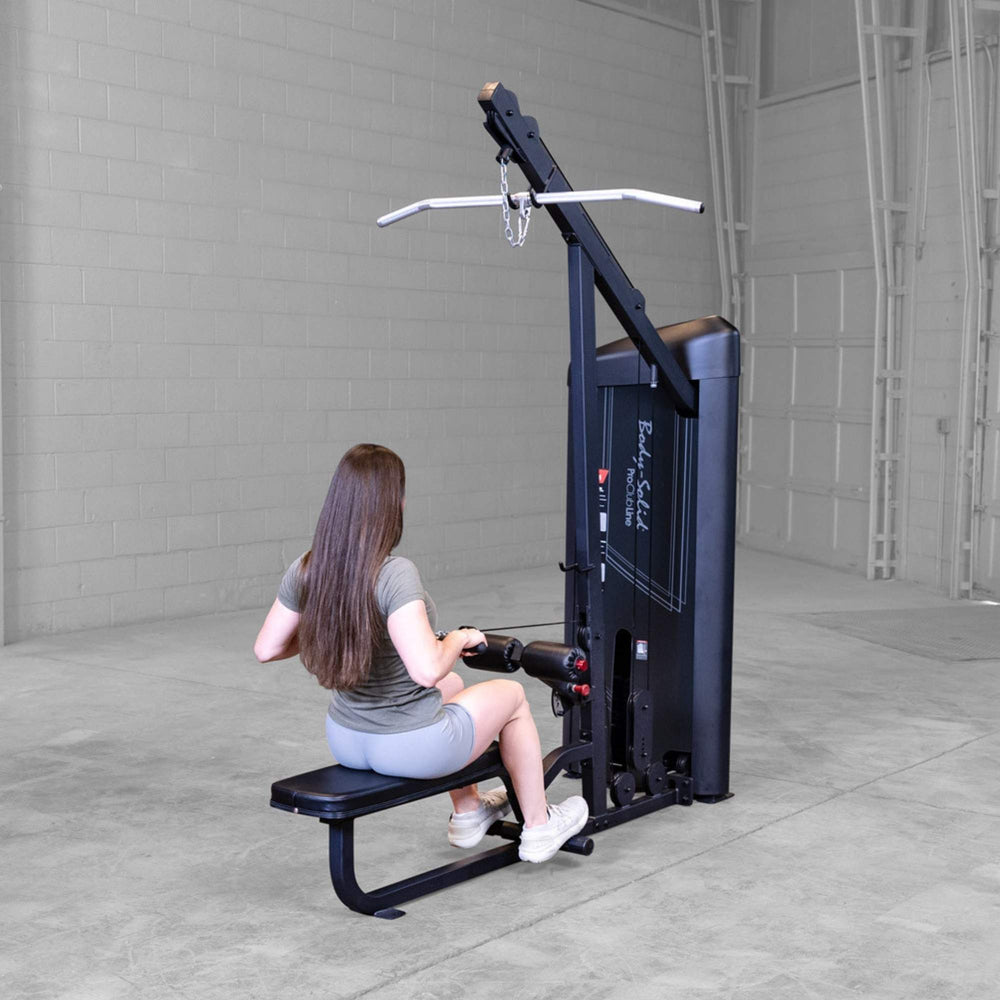 Body-Solid Series 2 Lat Mid Row S2LATX  Woman performing seated row exercise from behind on Body-Solid ProClub Line machine with bench and foot braces
