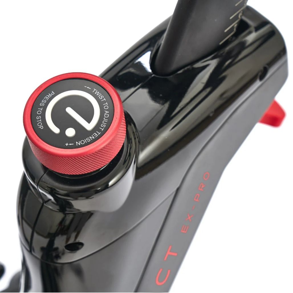 Echelon-EX-Pro-Bike-Close-up of a black bicycle seat post with a red adjustment knob on a white background