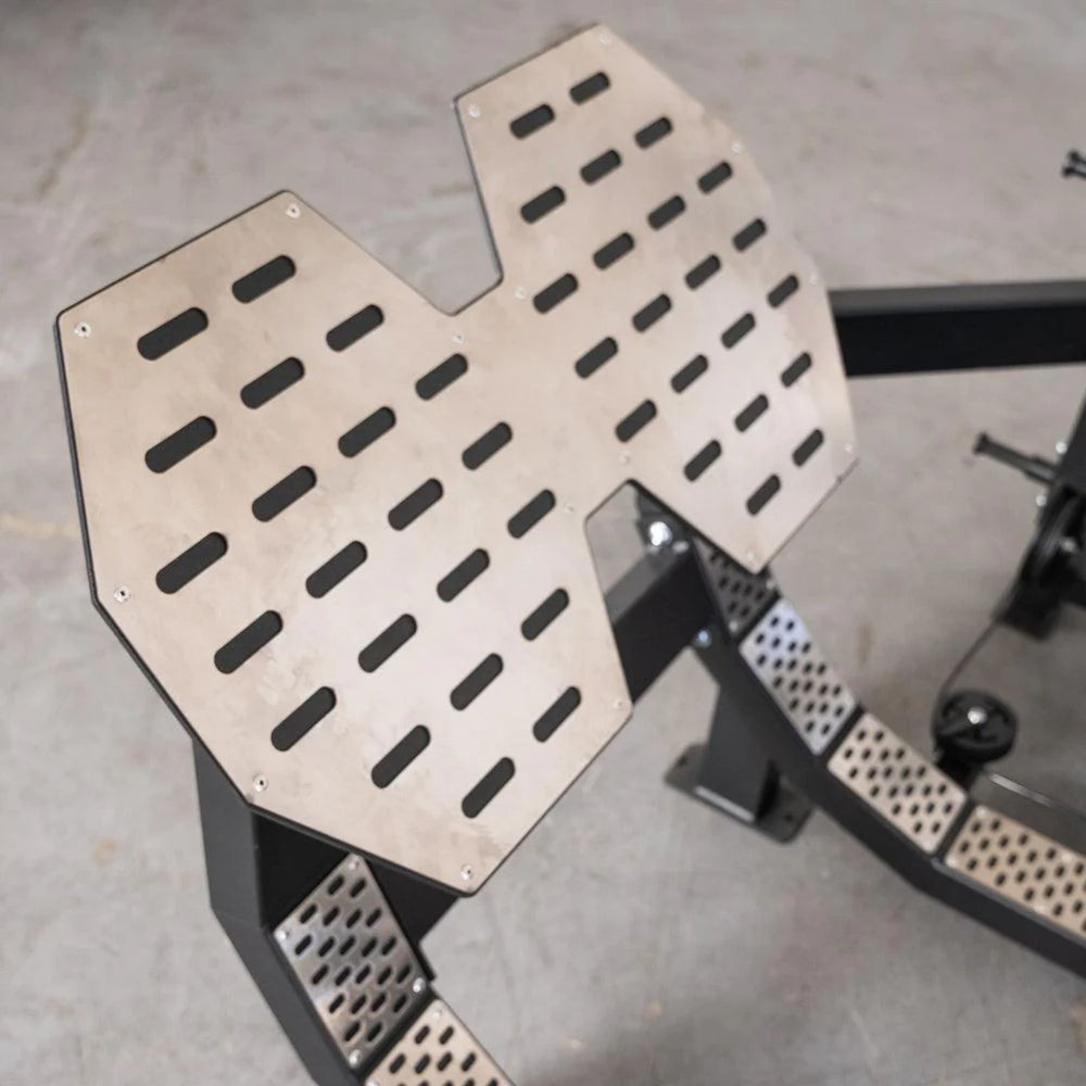 Metal foot plate with perforated design on a Excel Selectorized Hip Thrust Glute S-G-HTG
