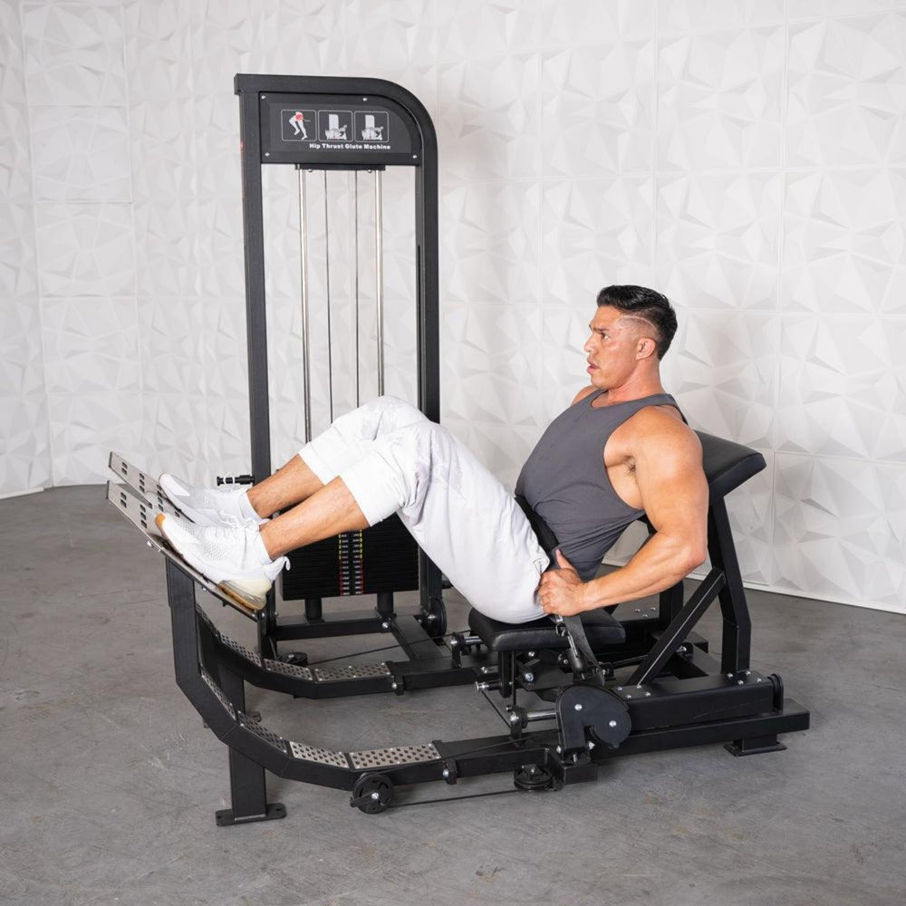 Man doing a glute drive, preparing for the next rep on a Excel Selectorized Hip Thrust Glute S-G-HTG