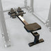 A rower installed in a body-solid power rack