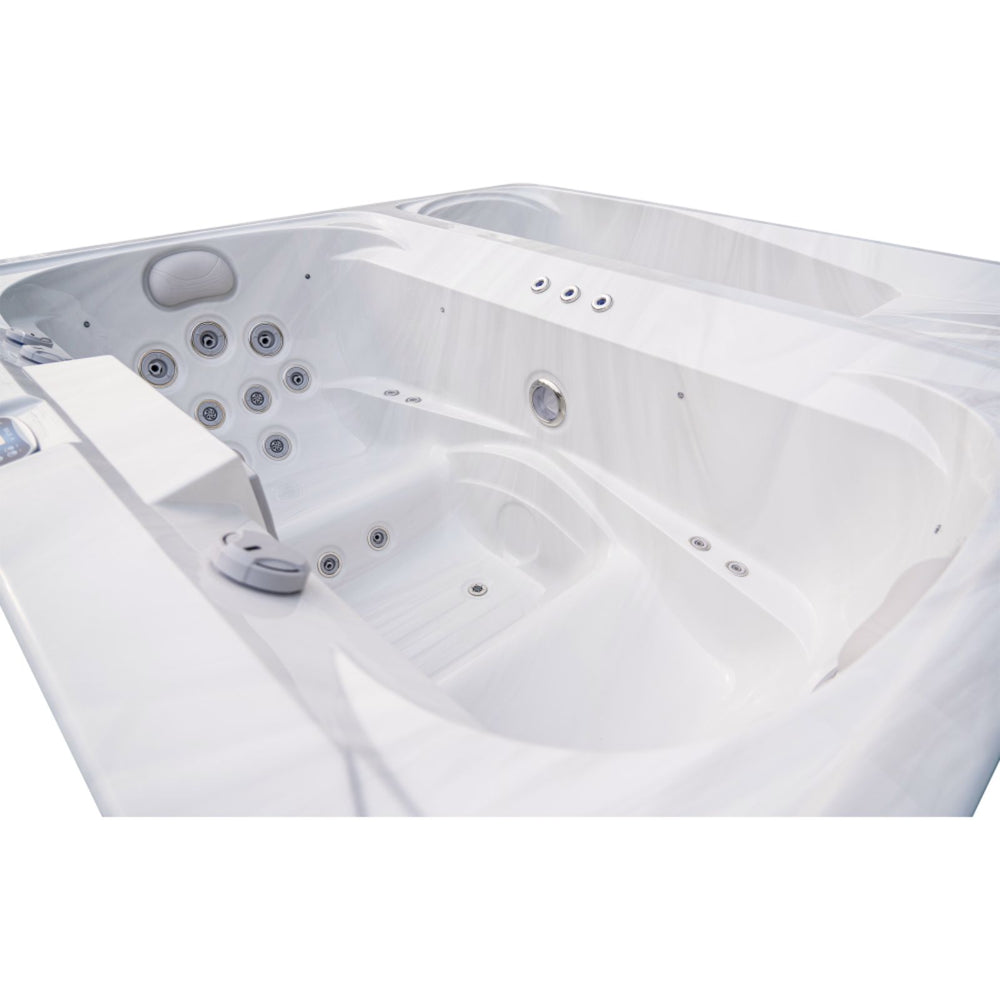 White Luxury Spas USA Marquis Hot & Cold Contrast Therapy Spa tub with multiple jets on a white background