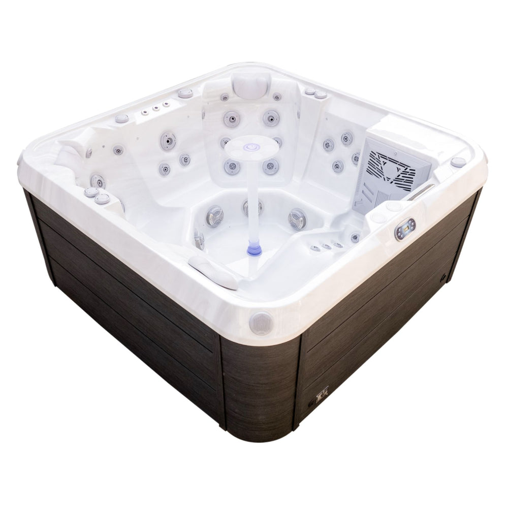 A square Luxury Spas Liberty 5-Person hot tub with a dark brown wood-look exterior and a white interior, shown from an elevated angle on a plain white background.