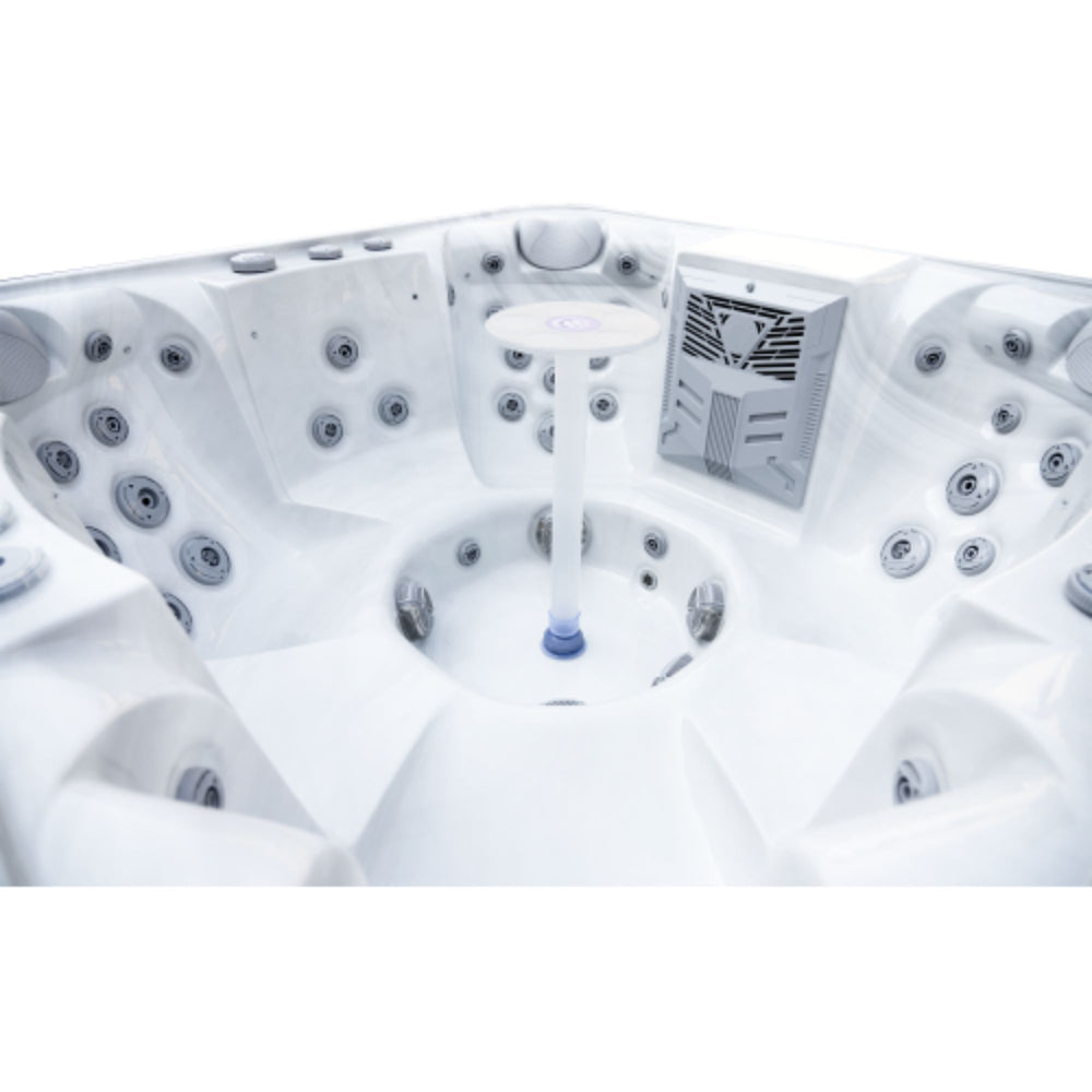 Luxury Spas Denali 7-Person Hot Tub with multiple jets and a control panel on a white background