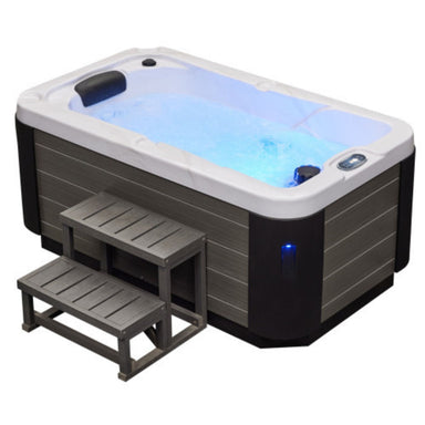 Luxury Spas Solo 1-Person Hot Tub With Water and Lighting View