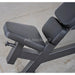 Muscle D weight leverage pec fly bench  adjustable seat with dark gray padded seat and backrest on a metal frame, photographed on a light concrete floor. A large 'MuscleD' watermark is visible across the center.