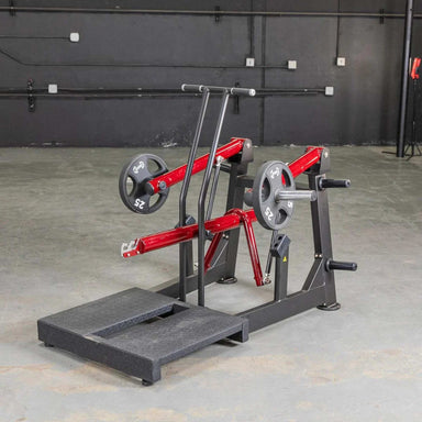 Full side view of the Muscle D Power Leverage V2 Belt Squat , displaying the seat and weight plates in the rest position.