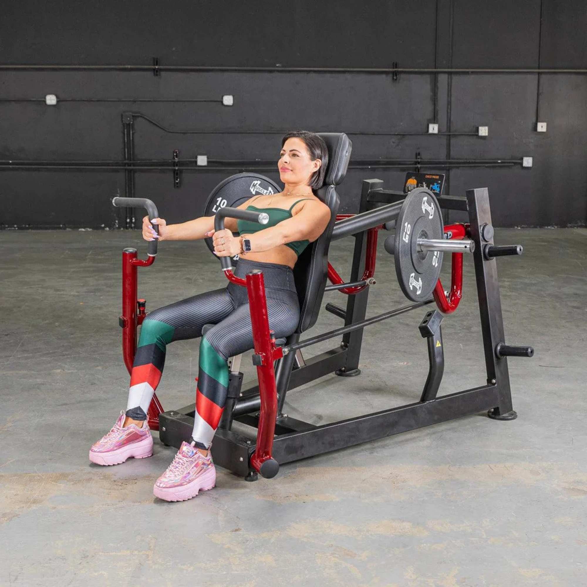 Muscle D Power Leverage V2 Chest Press - Female starting position.