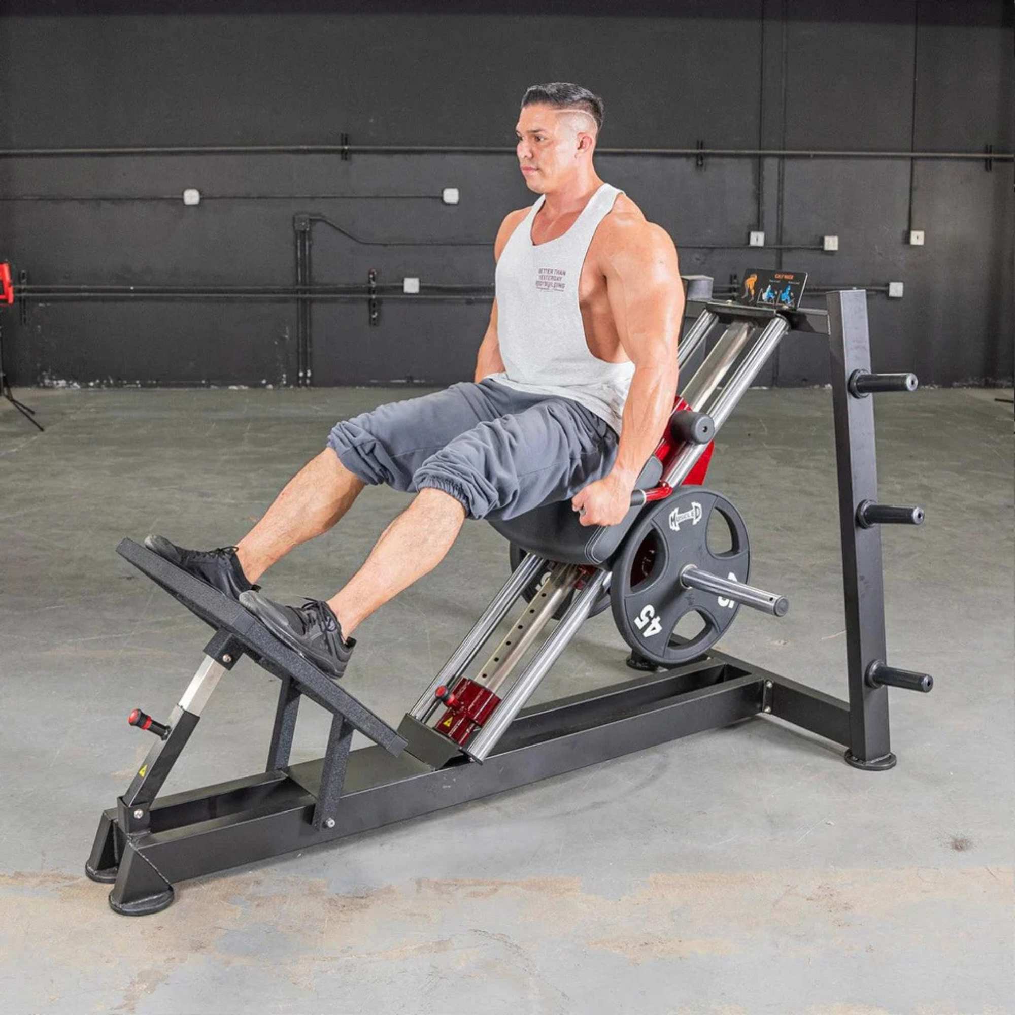 Muscle D Power Leverage V2 Hack Squat with user raising up to a standing positon from a squat exercise position. 