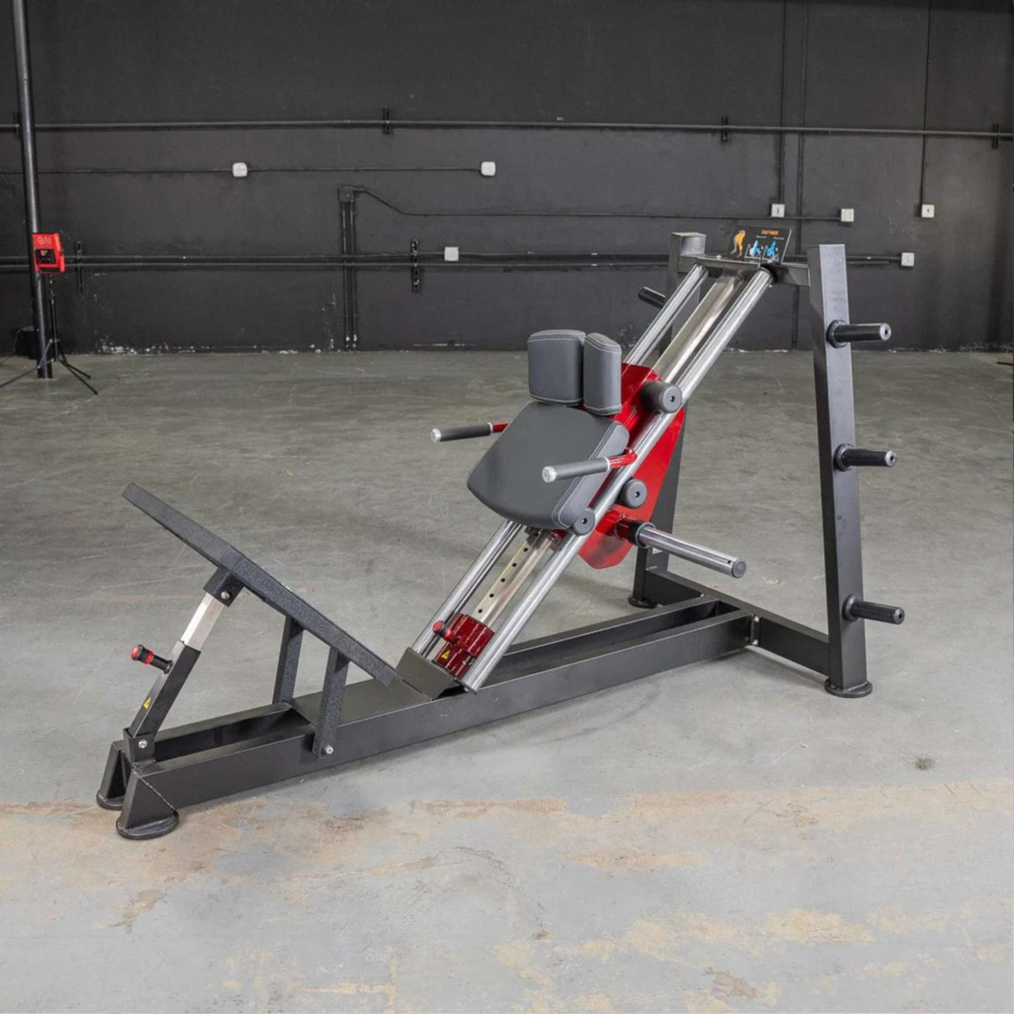 Muscle D Power Leverage V2 Hack Squat machine in full side view, featuring Olympic plate loading system