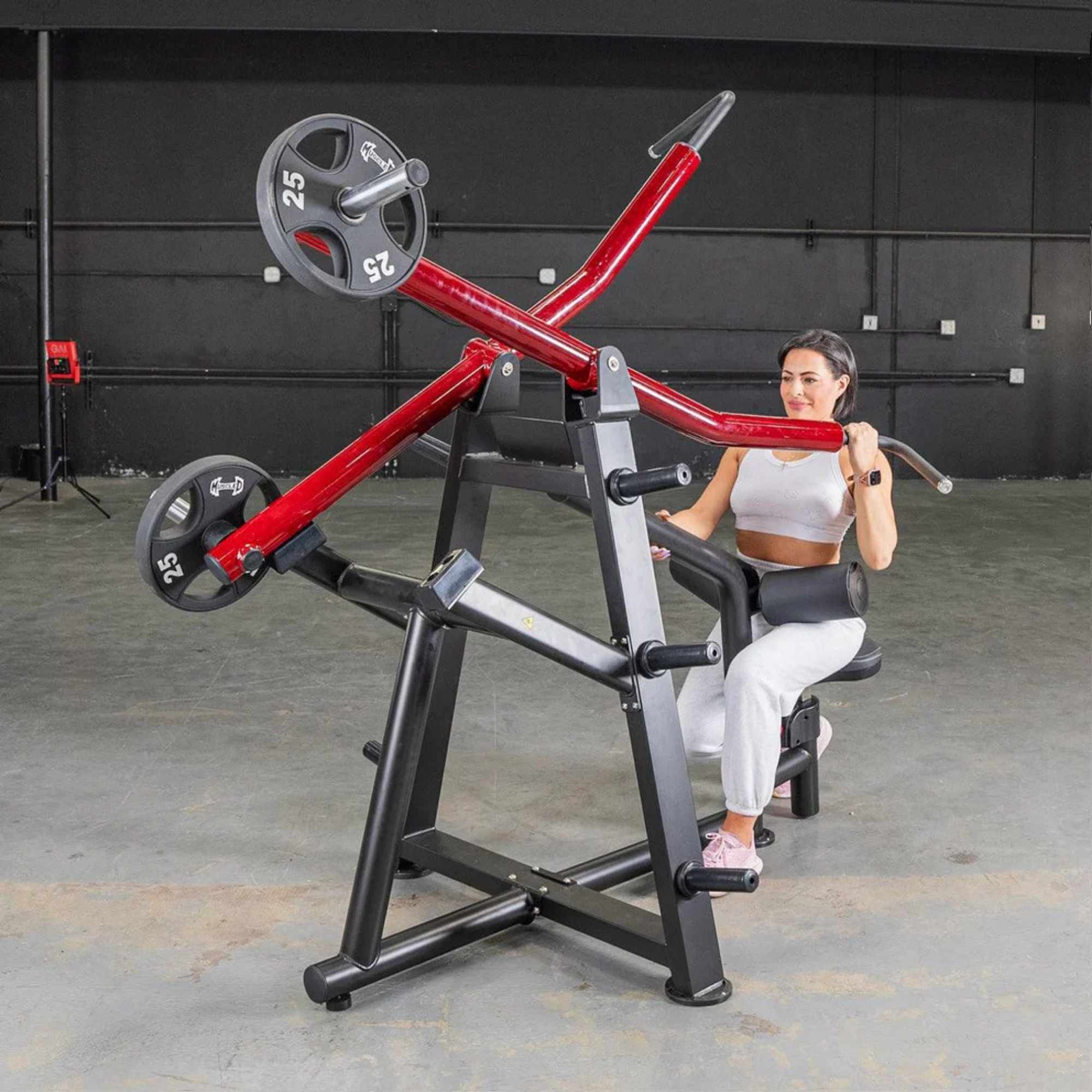 Side view of Muscle D Power Leverage V2 Iso-Lateral Lat Pulldown machine during a seated close-grip pulldown.