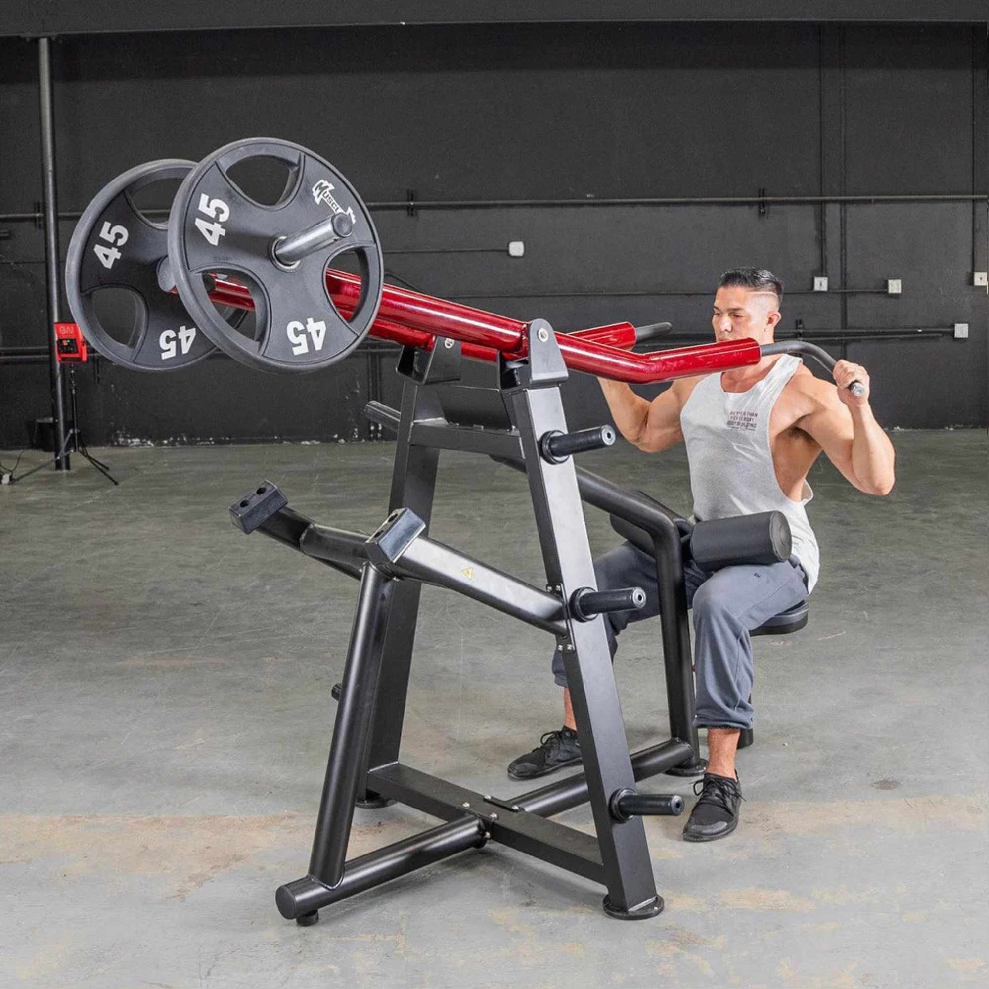 Muscle D Power Leverage V2 Iso-Lateral Lat Pulldown machine during a close-grip pulldown exercise with 45-lb plates.