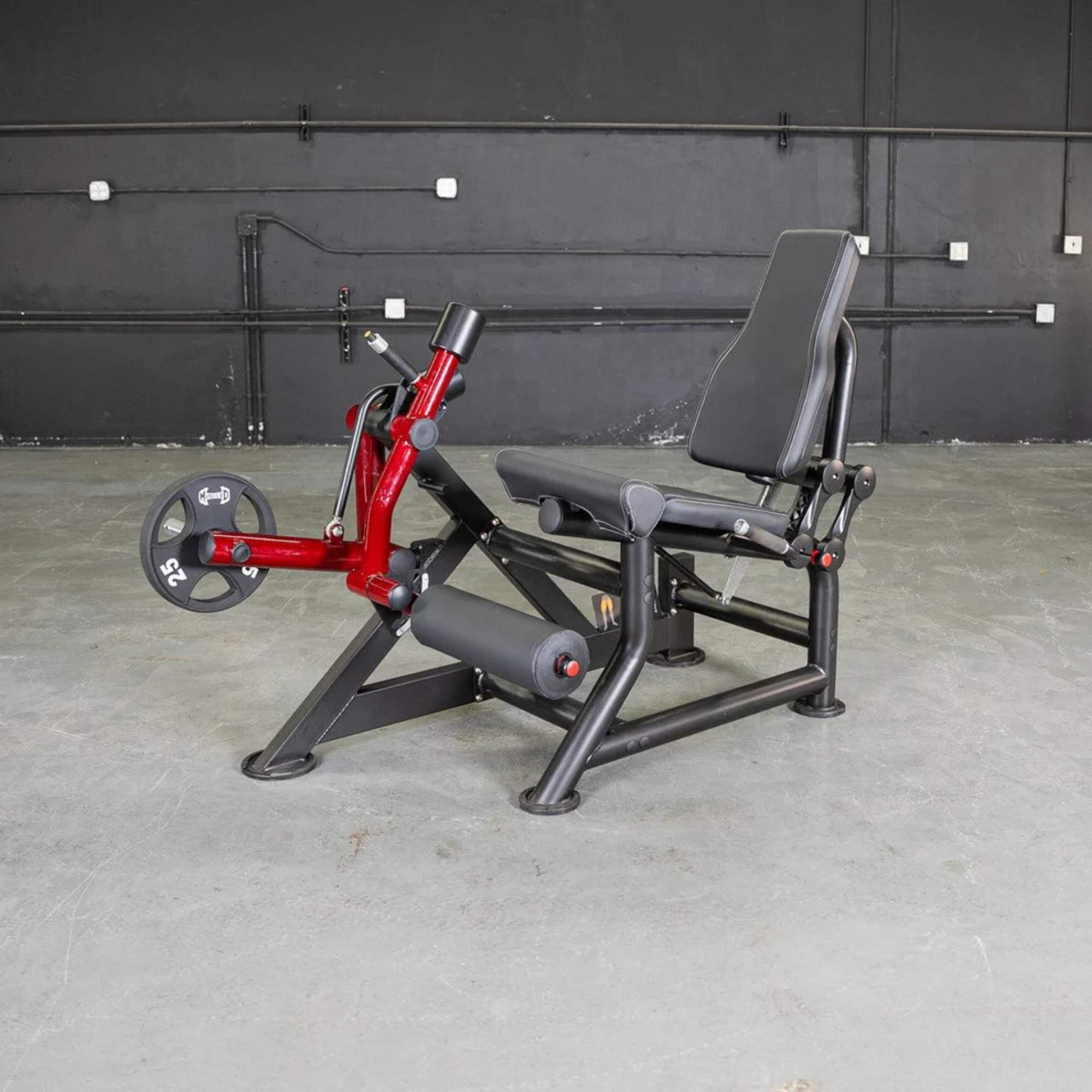 Full side view of the Muscle D Power Leverage V2 Leg Extension, displaying the seat and weight plates in the rest position.