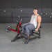 Muscle D Power-Leverage V2 Leg Extension machine with 25lb plates, durable design for commercial gyms.