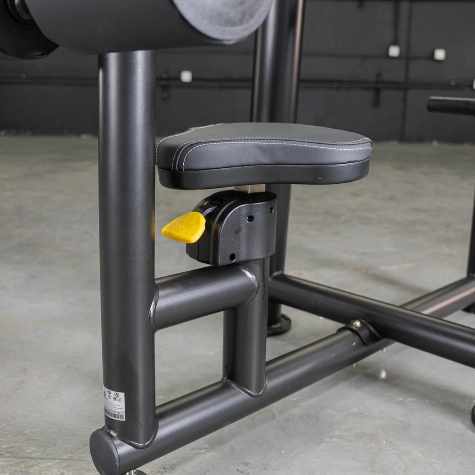 Close-up of the adjustable seat and backrest on the Muscle D Power Leverage V2 Reverse Grip Lat Pulldown
