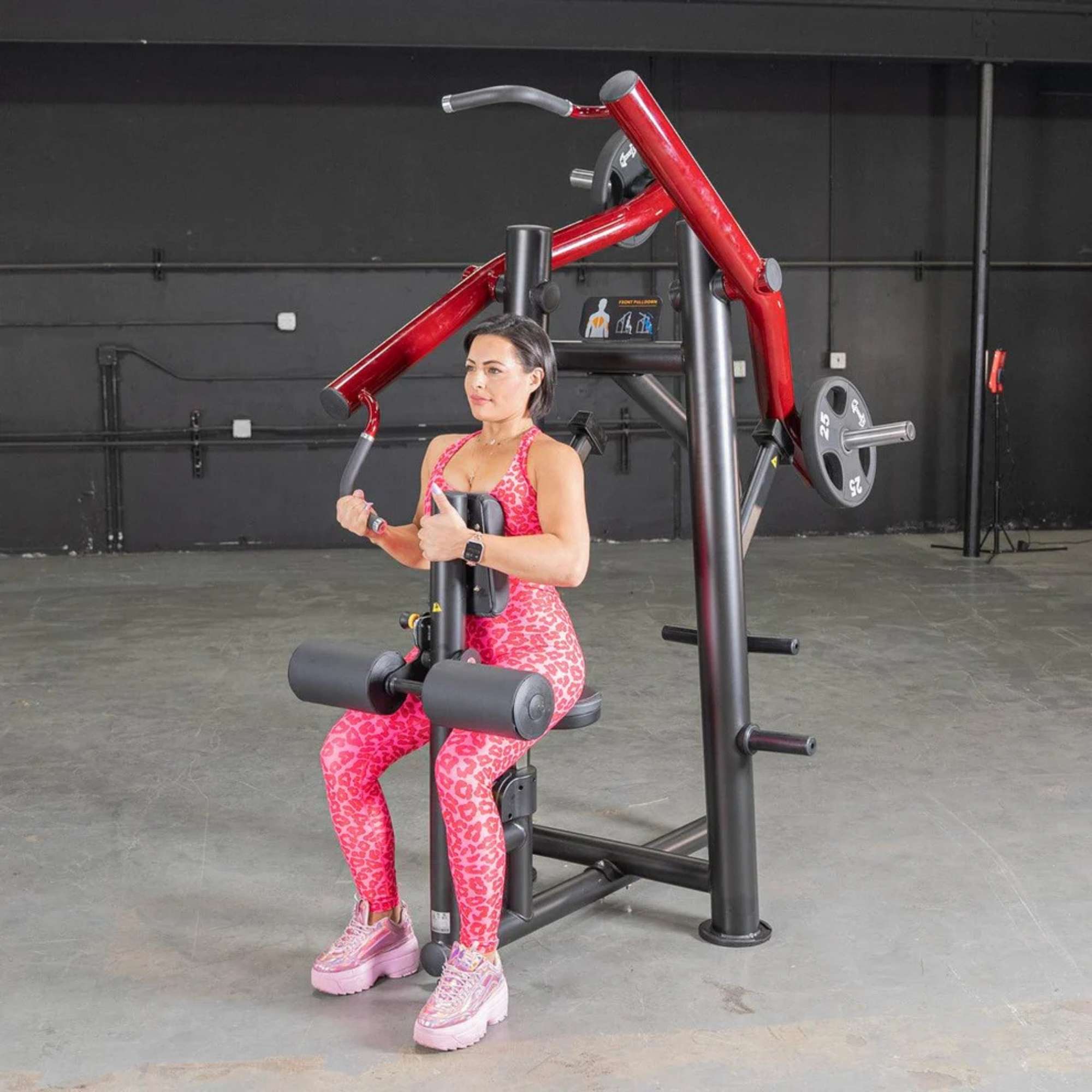 Muscle D Power Leverage V2 Reverse Grip Lat Pulldown PL-PV2-FLP with Urethane Coated Olympic Plates - Female in start position, preparing for a lat pulldown workout.