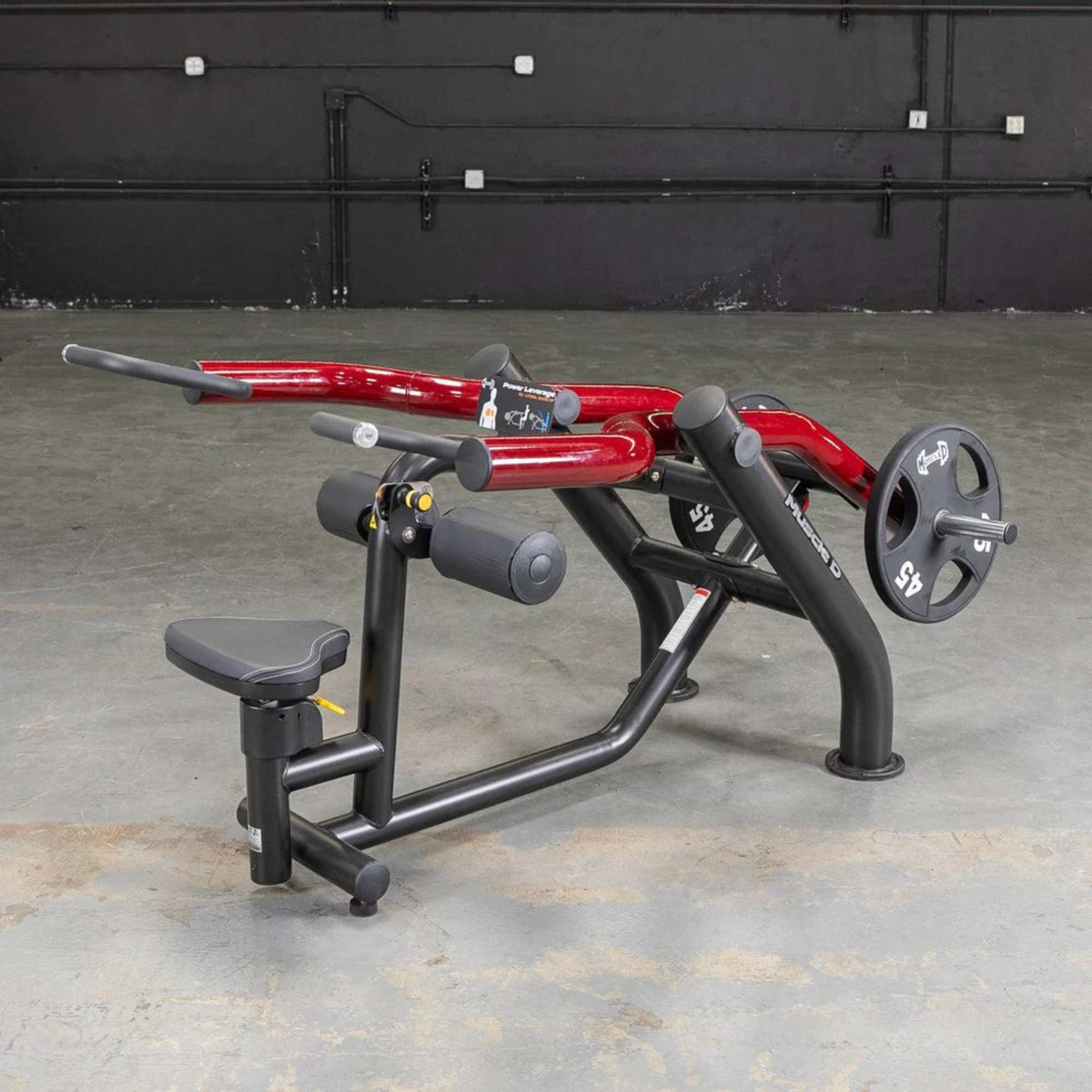 Side view of the Muscle D  Power Leverage V2 Seated Dip / Triceps Press  with a user-ready seat and handles, displaying the machine setup.
