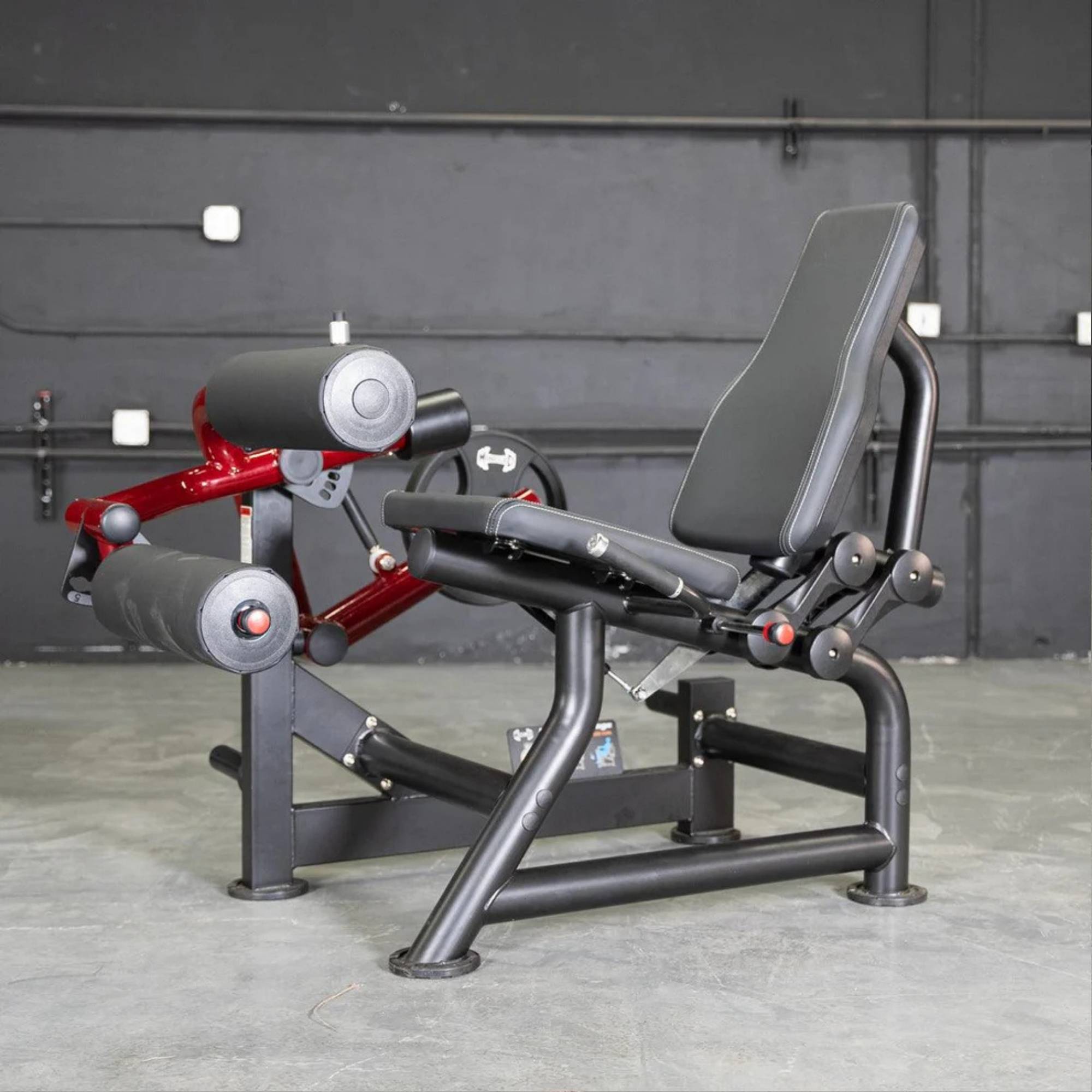 Full side view of the Muscle D Power Leverage V2 Seated Leg Curl, displaying the seat With Background