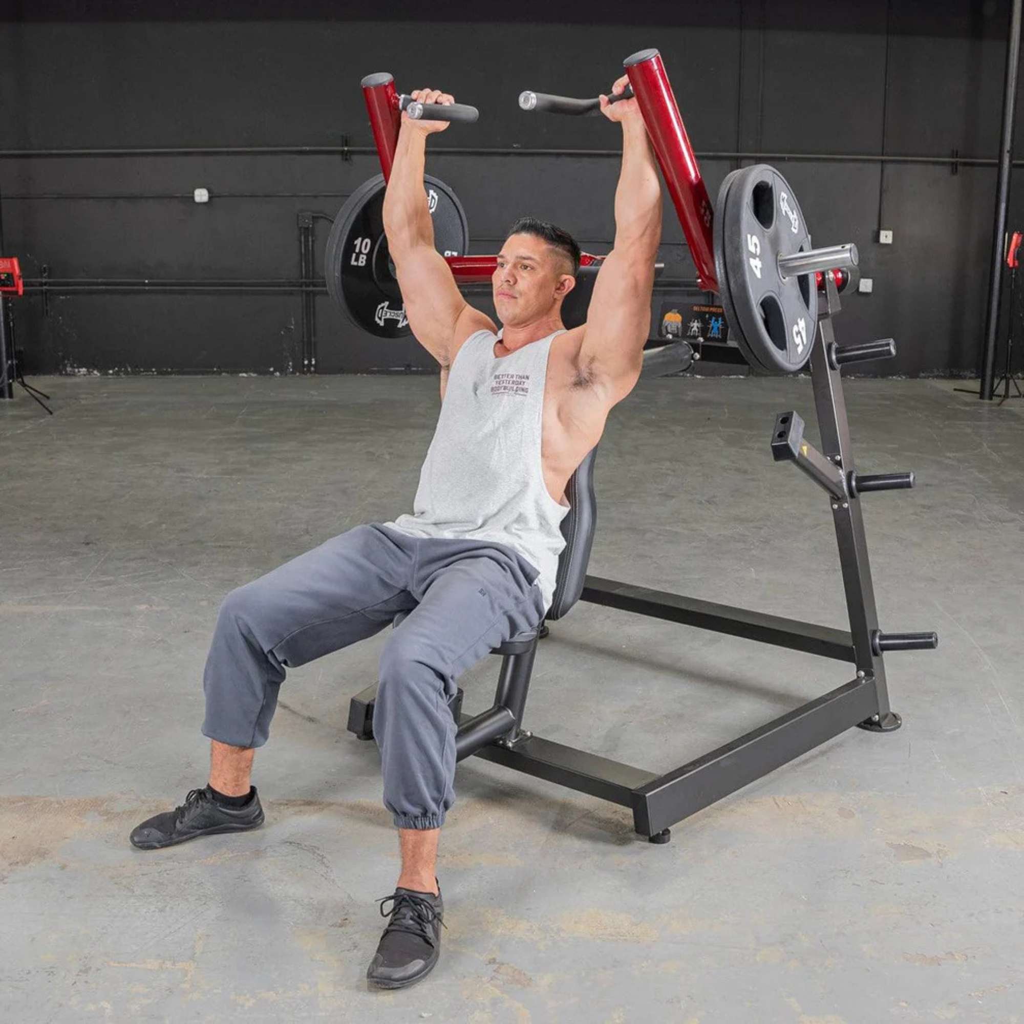 Seated shoulder press with Muscle D Power Leverage V2 equipment.