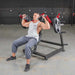 Man using Muscle D Power Leverage V2 Shoulder Press machine.