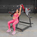 Woman lifting weights on PL-PV2-SP Muscle D Shoulder Press