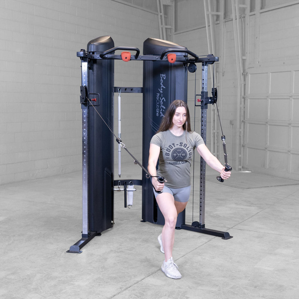 Woman doing a chest fly on a Body-Solid Pro ClubLine S2CCX Series II Cable Column in black