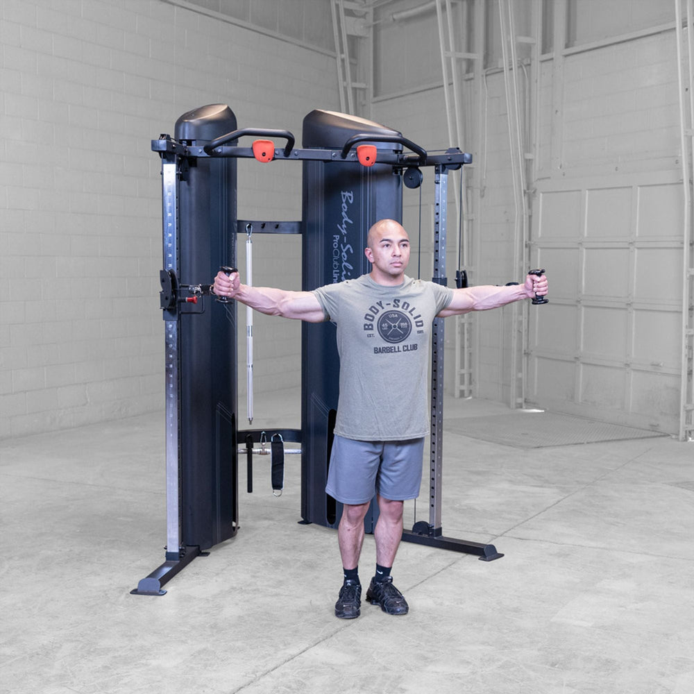 Man doing a cable chest fly on a Body-Solid Pro ClubLine S2CCX Series II Cable Column in black