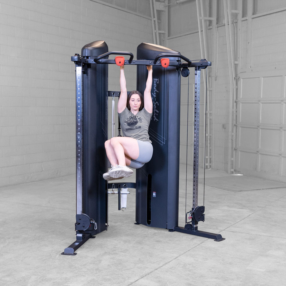 woman doing core exercises on a Body-Solid Pro ClubLine S2CCX Series II Cable Column in black
